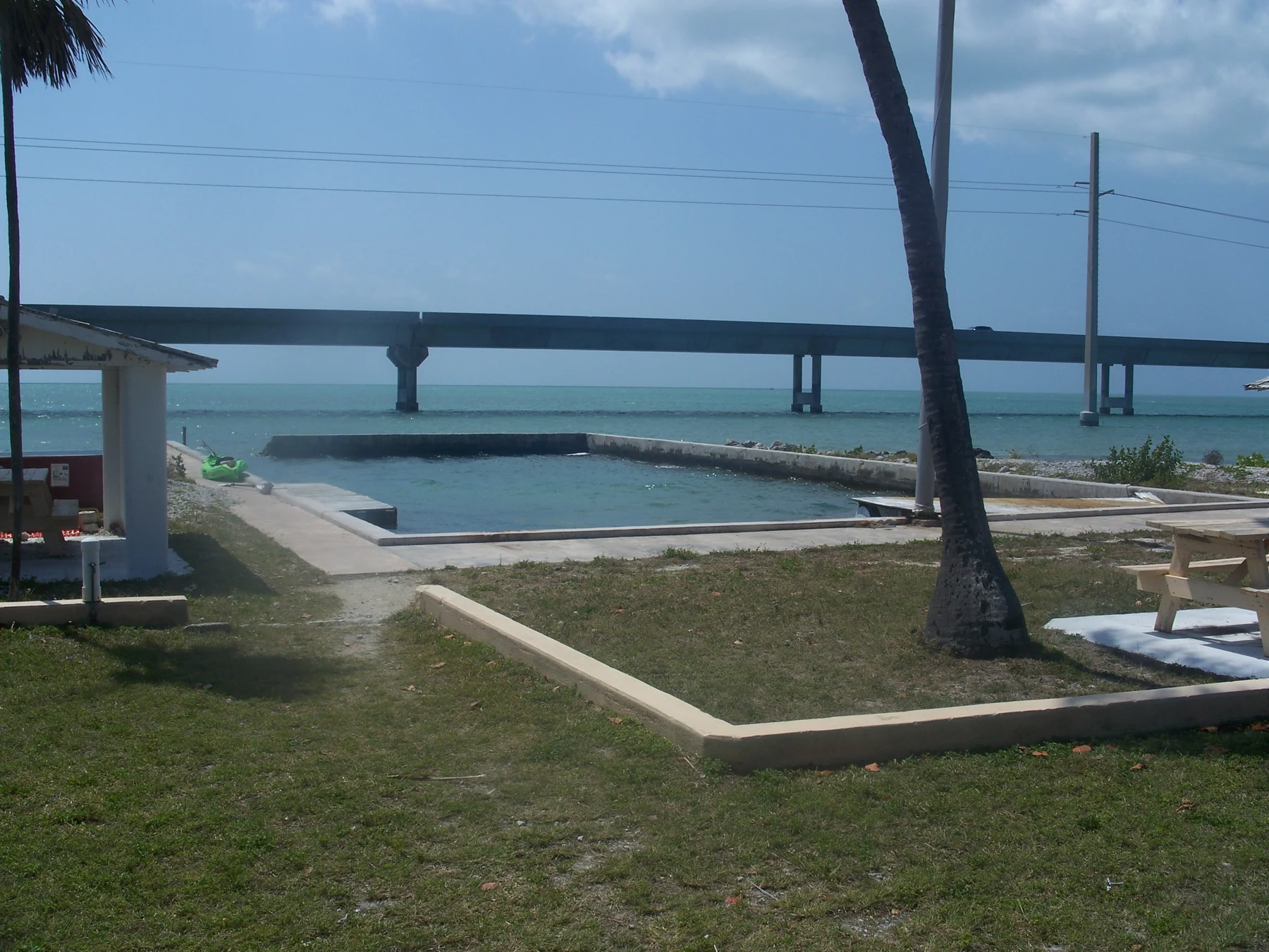 Historic saltwater pool and modern bridge at Pigeon Key, 2011